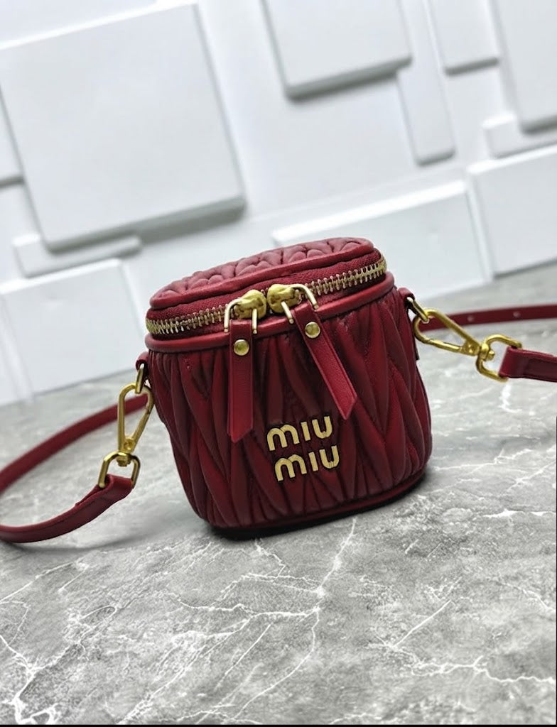 Miu Miu Matelassé Leather Cylinder Vanity Bag