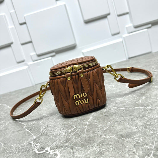Miu Miu Matelassé Leather Cylinder Vanity Bag