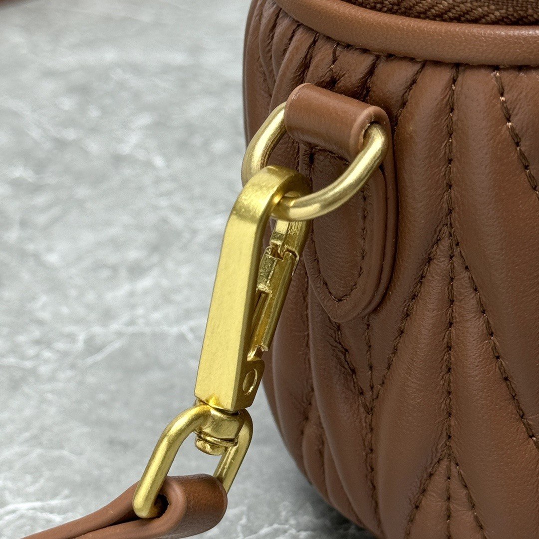 Miu Miu Matelassé Leather Cylinder Vanity Bag
