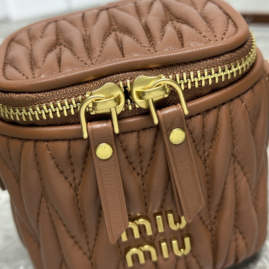Miu Miu Matelassé Leather Cylinder Vanity Bag
