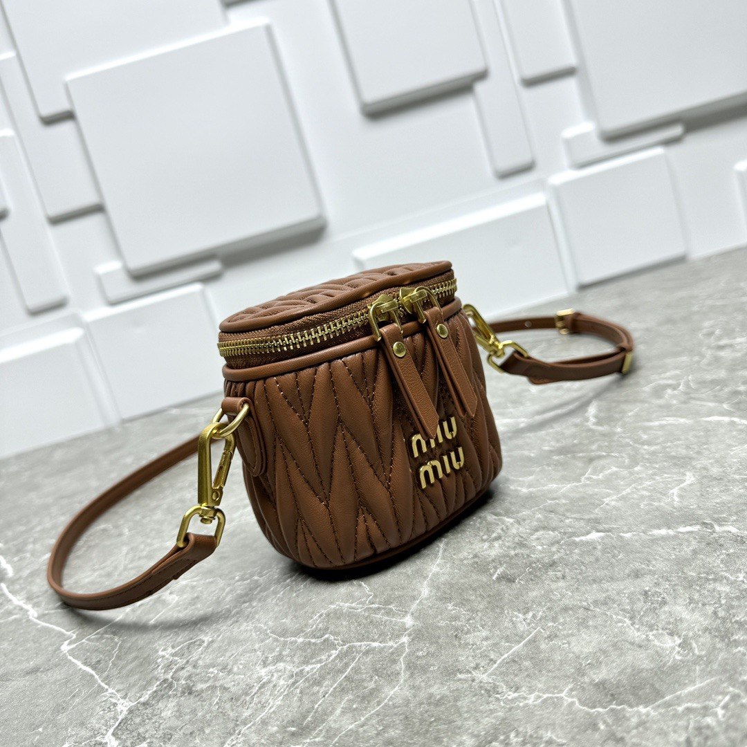 Miu Miu Matelassé Leather Cylinder Vanity Bag
