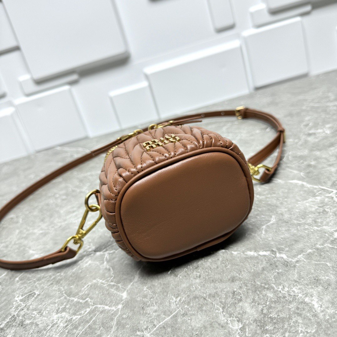 Miu Miu Matelassé Leather Cylinder Vanity Bag