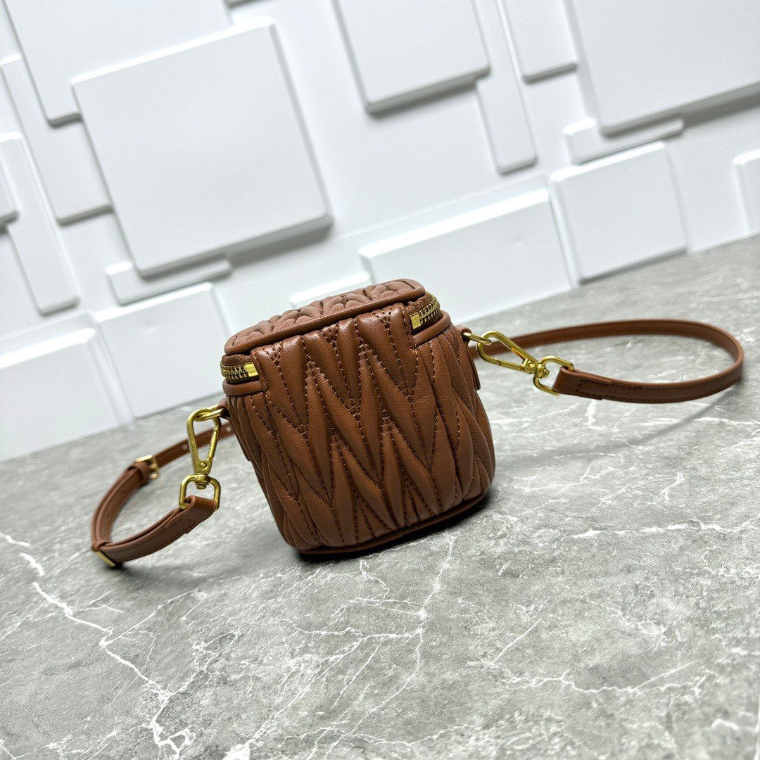 Miu Miu Matelassé Leather Cylinder Vanity Bag