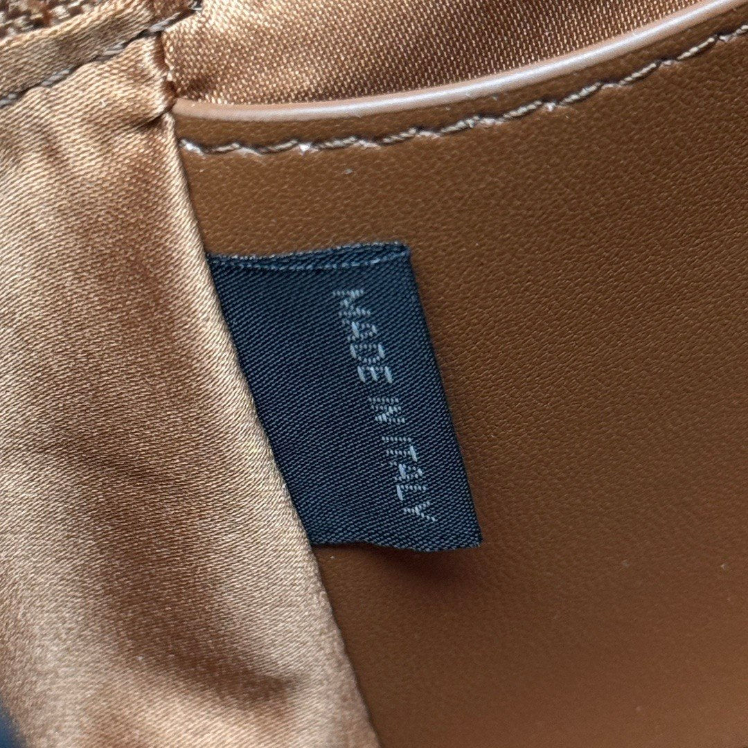 Miu Miu Matelassé Leather Cylinder Vanity Bag